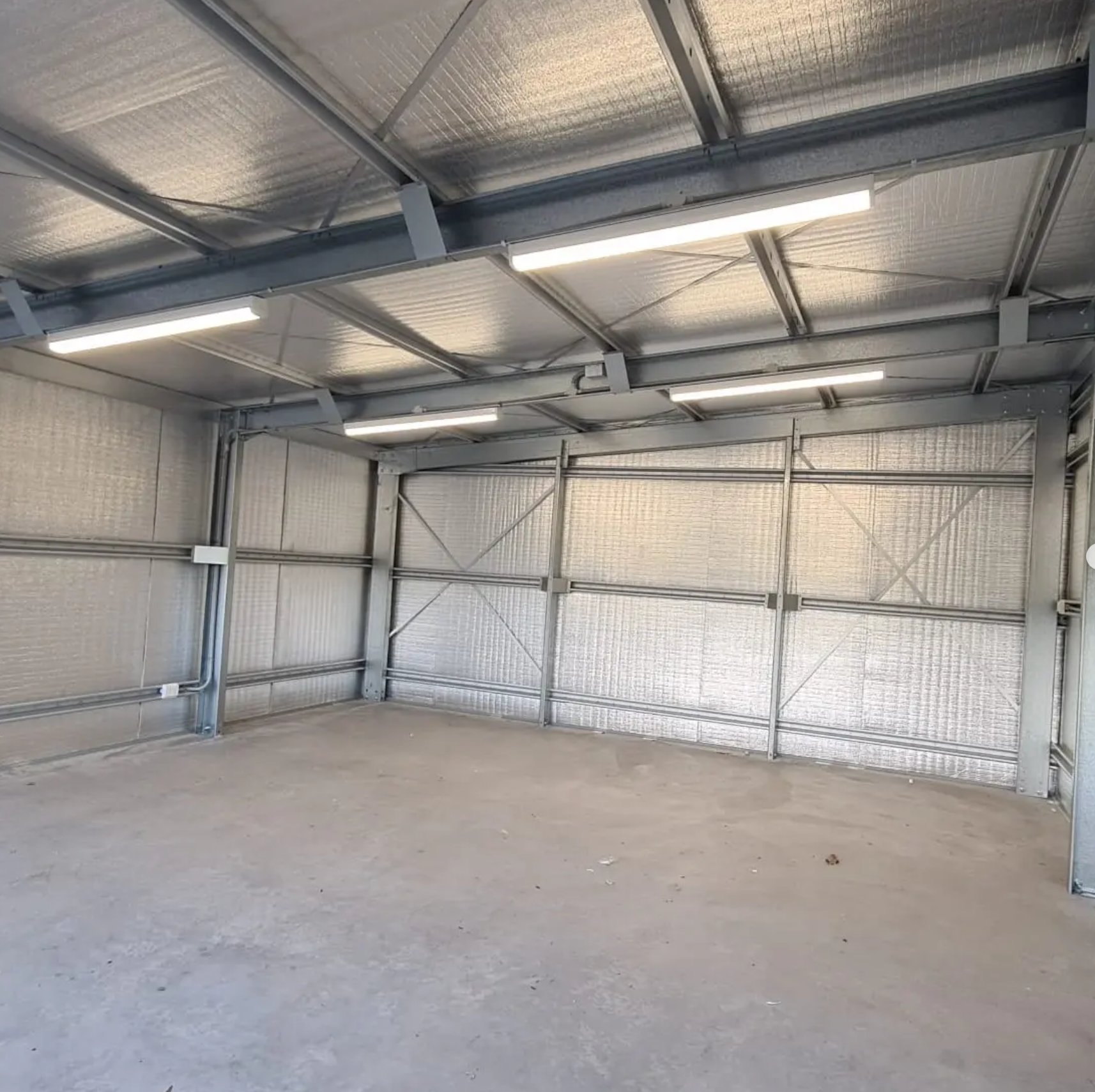 LED batten lights installed in a new shed — shed power and lighting Noosa