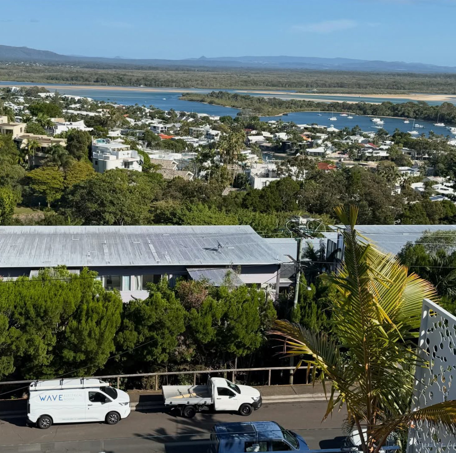 Wave Electrical van in Noosa with river and hinterland backdrop