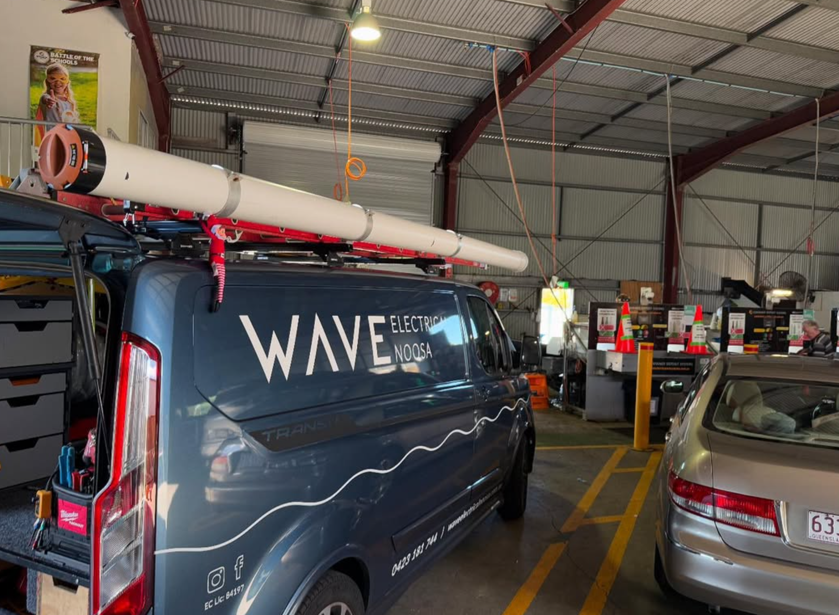 Wave Electrical van inside a commercial facility — Containers for Change, Sunshine Coast