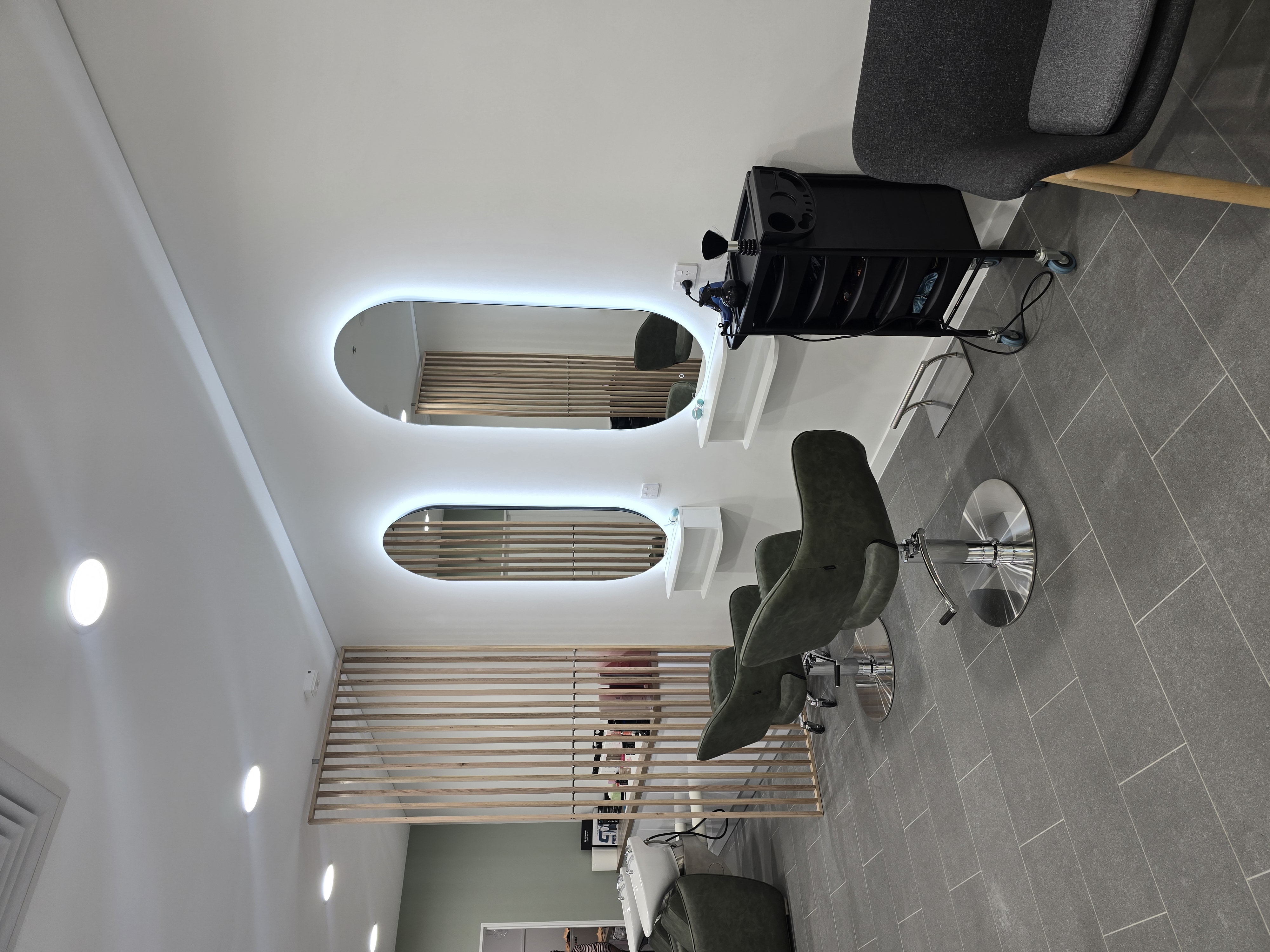 LED backlit mirrors — Gigi Hair salon fit-out Noosa