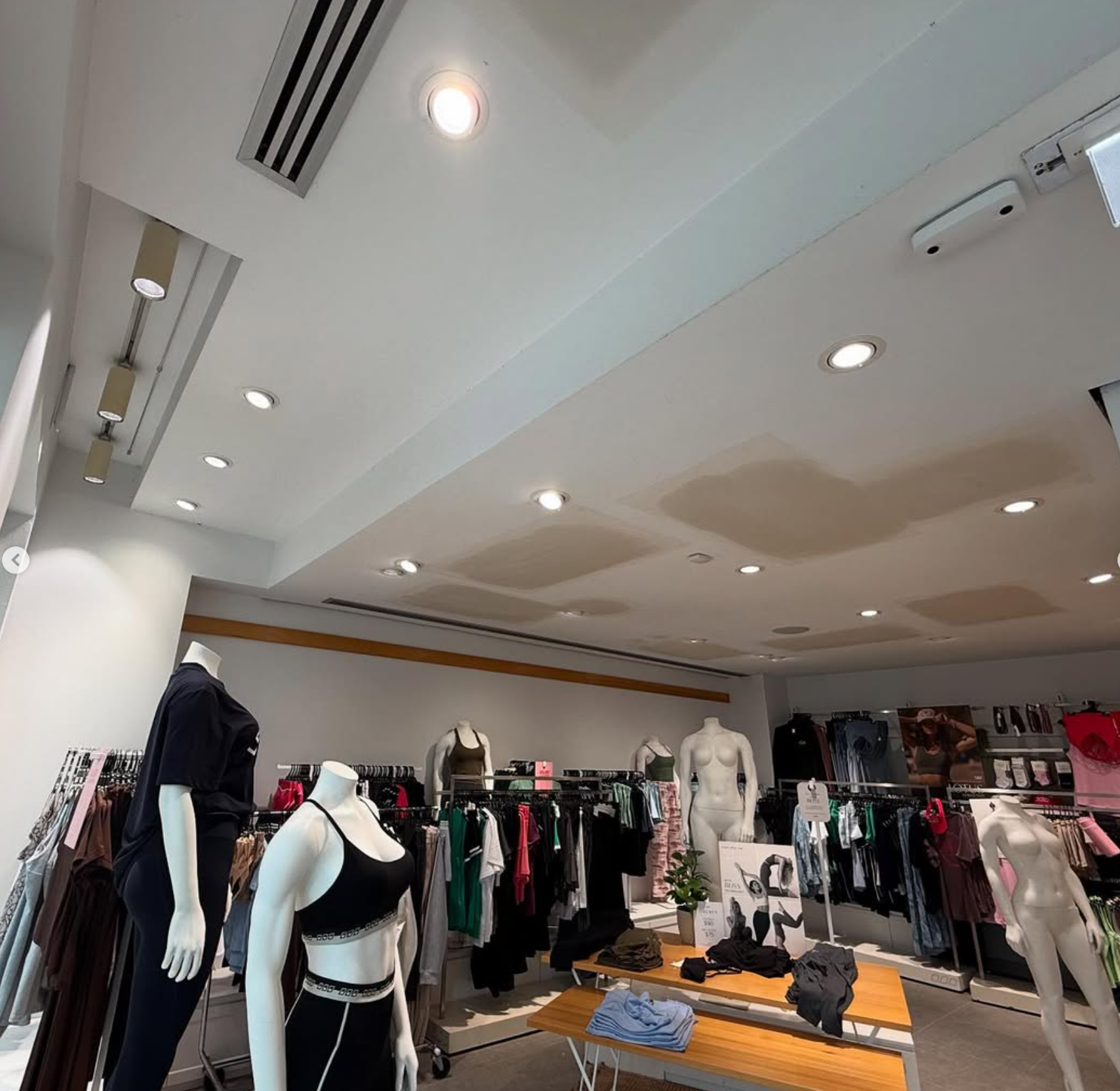 Downlights and split system air conditioning — Lorna Jane store interior Noosa