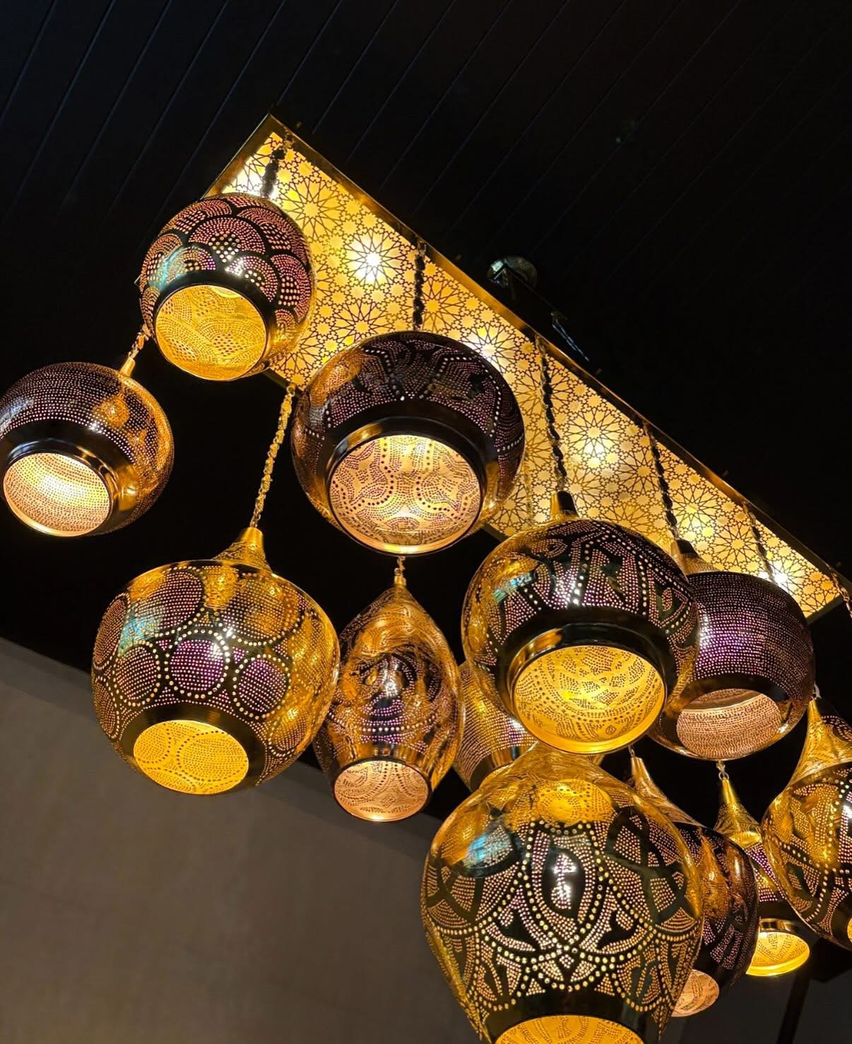 Ornate pendant lights wired and installed — Noosa restaurant