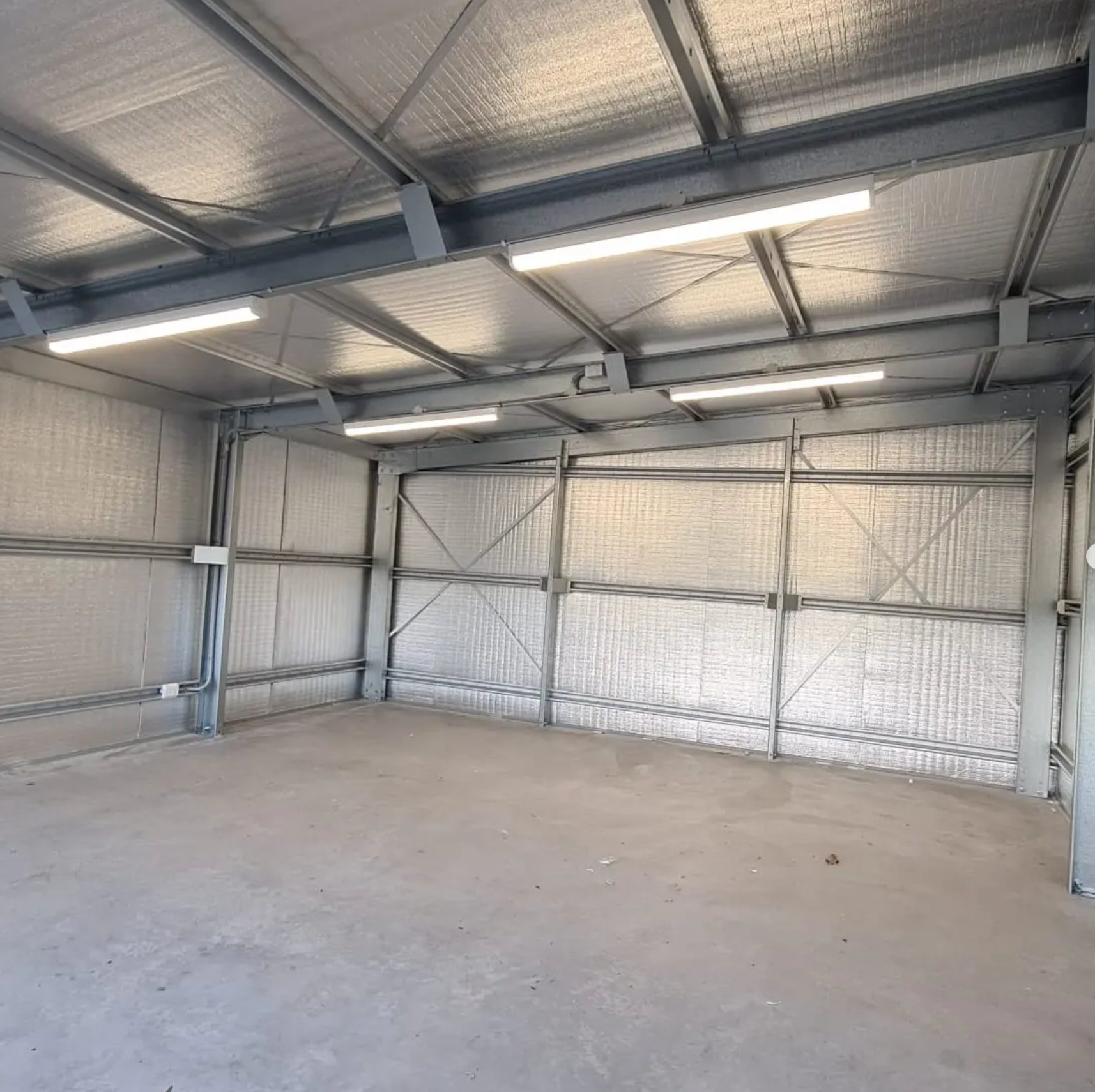 LED batten lights installed in a new shed — shed power and lighting Noosa
