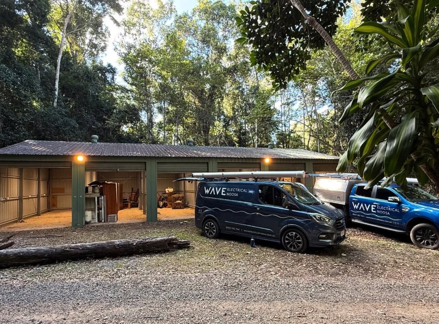 Wave Electrical van and ute at a rural property